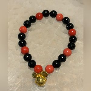 Black obsidian red chalcedony and mickey charm